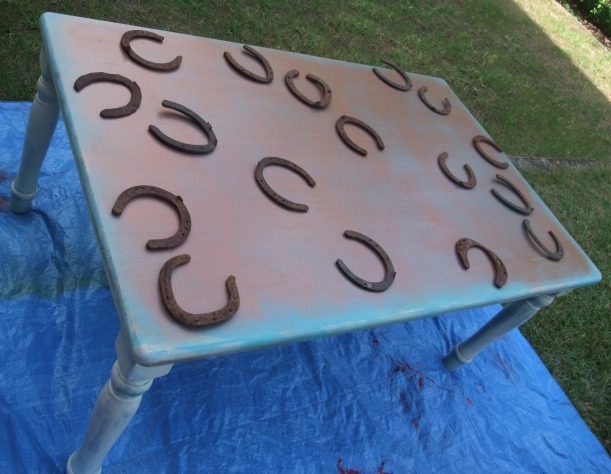 2 place horse shoes on table
